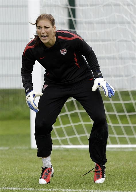 United States Goalkeeper Hope Solo Instructs Teammates During A Training