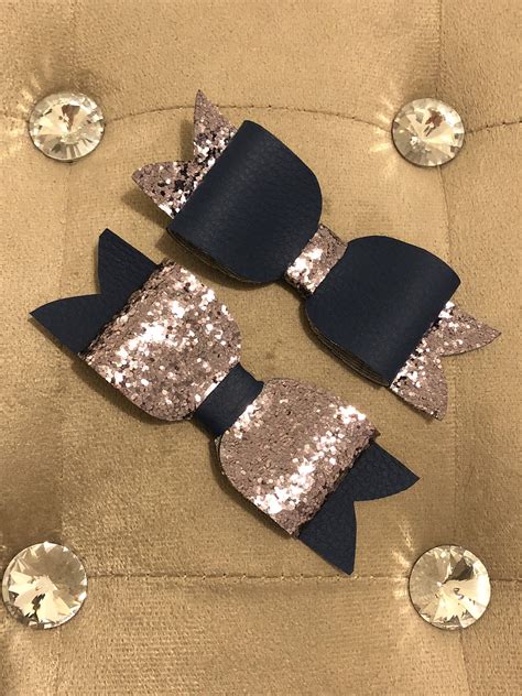 Pair Of Chunky Glitter And Faux Leather Grey And Navy Bows By