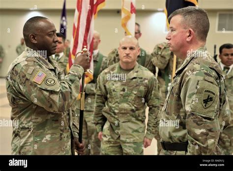 Command Sgt Maj Peter Trotter Left Holds The Nco Sword After