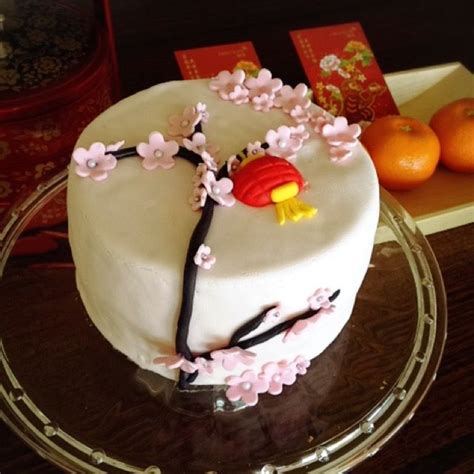 They give them out as an alternative to fortune cookies (which, by the way, don't exist in china!) let the feasting begin! Chinese New Year 2016 cake decorated with Chinese Lantern and Cherry Blossoms | Cake, Themed ...