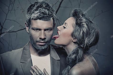 Woman Licking Man S Cheek Stock Photo Konradbak