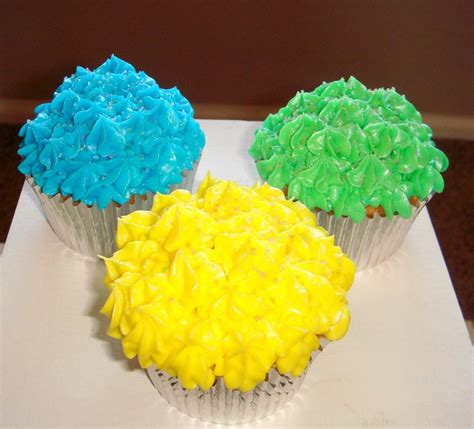 Bella Cake Blue Green And Yellow Buttercream Cupcakes