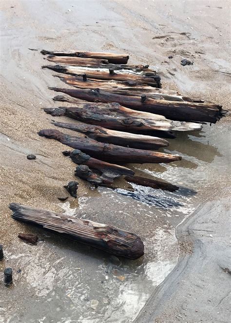 Remains Of Shipwreck Exposed In Surf City
