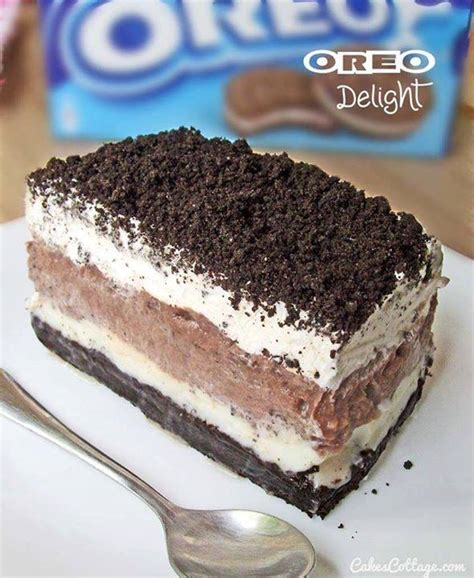 Chewy red velvet brownie topped with luscious oreo cream cheese mousse, chocolate ganache and oreo crumbles. Oreo Delight - Best Cooking recipes In the world