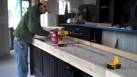 Measure the inside edge of the plywood side pieces and cut. Bar top prep Concrete bar top Dublin Square La Crosse WI ...
