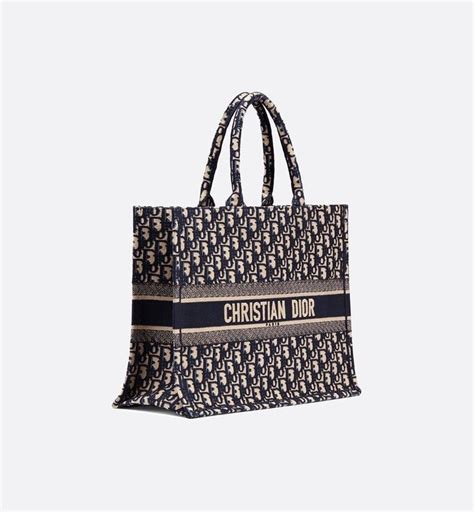 Christian dior's beautifully crafted handbags are known for their feminine and elegant aesthetics. Blue Dior Book Tote Dior Oblique bag - Bags - Women's ...