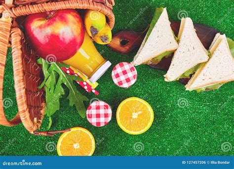 Picnic On The Grass Red Checked Tablecloth Basket Stock Photo