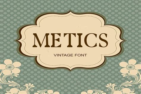 An Old Fashioned Floral Frame With The Word Metics On It In Brown And Green