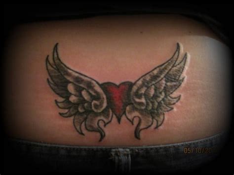 Heart Design With Wing Tattoo Tattoo This Beautiful Image Of Tattoos
