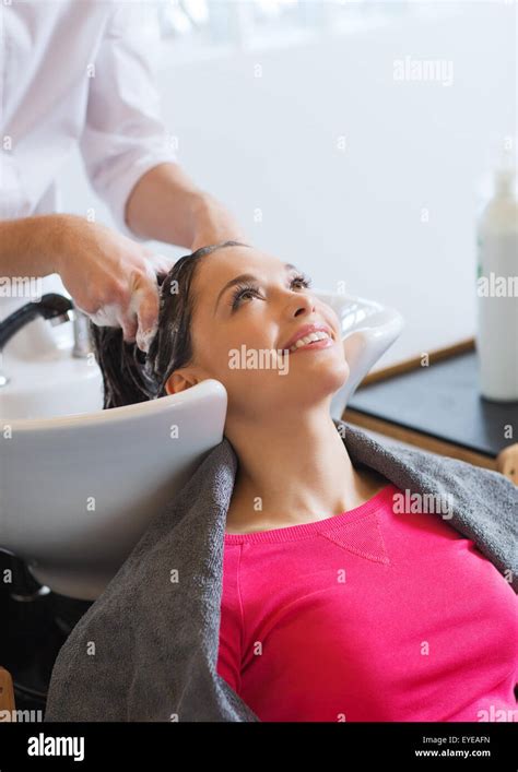 Happy Young Woman At Hair Salon Stock Photo Alamy