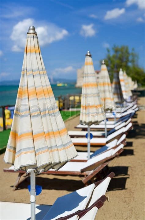 Beach Chairs And Umbrellas In Summer Stock Image Colourbox