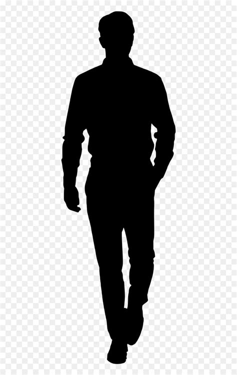 The Silhouette Of A Man Walking With His Hands In His Pockets On A