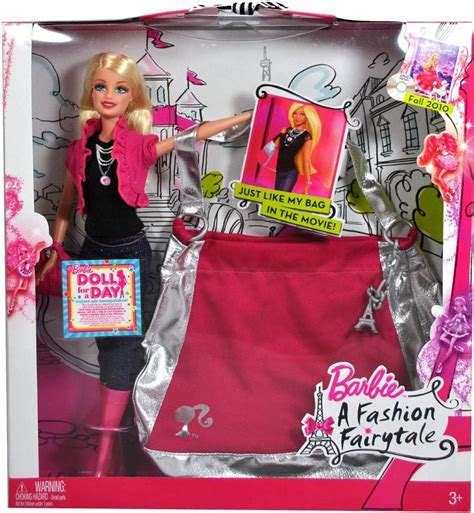 the barbie doll is wearing a pink skirt and black shirt with her hand on top of it