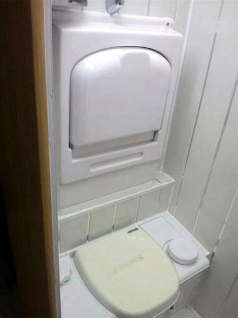 Toilet With Fold Up Sink Above For Efficient Use Of Space In Van