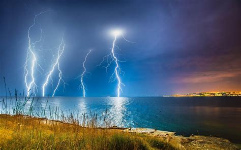 1080x1800 Resolution Lightning Above Body Of Water Nature Landscape