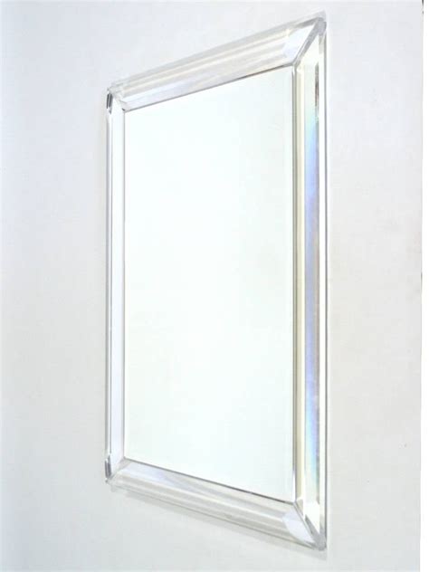 This sample club illustrates that adding just a simple piece of acrylic to. Mirror with Faceted Lucite Frame at 1stdibs