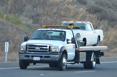 Securing The Car On A Flatbed Tow Truck Timber Towing And Recovery