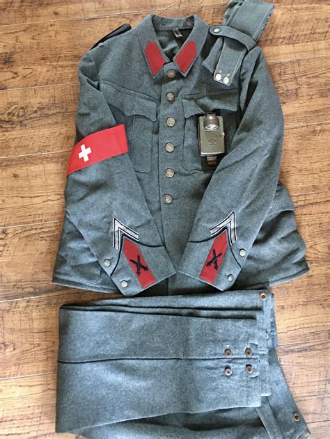 1945 Swiss Artillery uniform. Complete with garrison cap and pants. In super mint condition. I ...