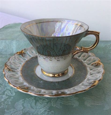On Ebay Lusterware Iridescent Tea Cup Saucer Gold Trim Blue Green Japan Pottery