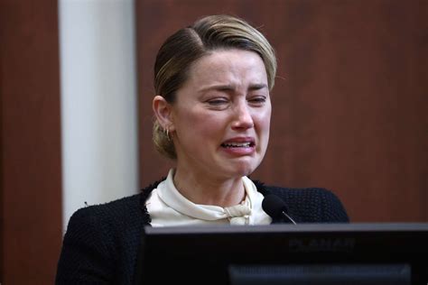 amber heard bursts into tears as she recalls alleged violation by johnny depp