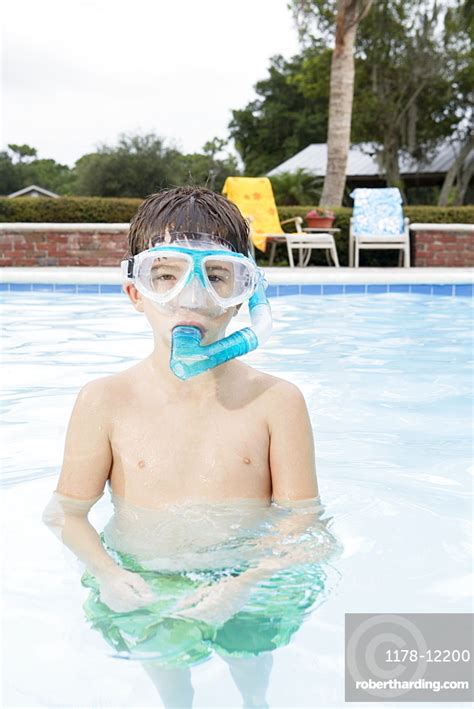 Boy Snorkeling In Swimming Pool Stock Photo