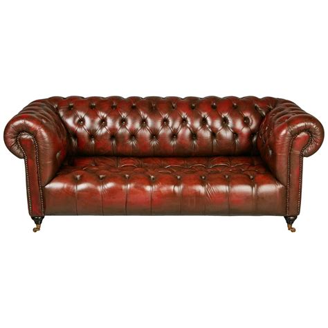 English Georgian Style Distressed Oxblood Leather Chesterfield Sofa