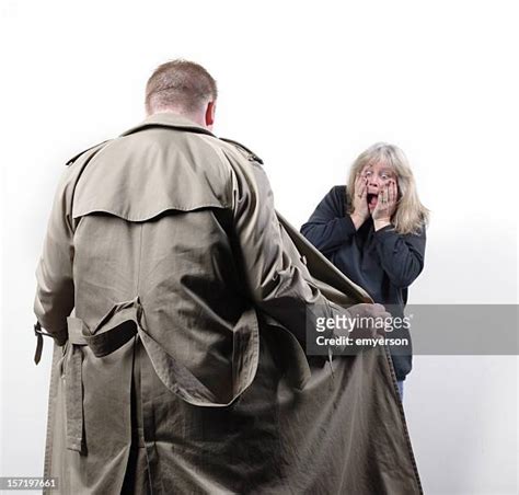 flasher trench coat photos and premium high res pictures getty images
