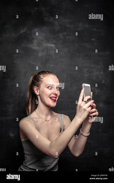 Woman Taking Silly Selfie Stock Photo Alamy