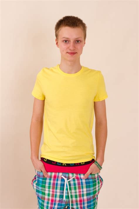 Twink Smiles Adorably As He Poses In His Tee Shirt And Hot