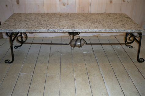 All for the low cost of $15! Scottish Lion wrought iron : Granite table with beach stones