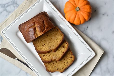 A Fall Classic Pumpkin Bread With Two Spoons