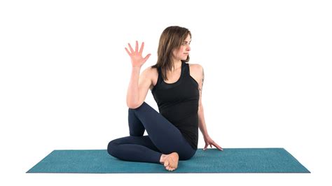 Practice Yoga Twists At The Wall To Increase Spinal Mobility Yogauonline