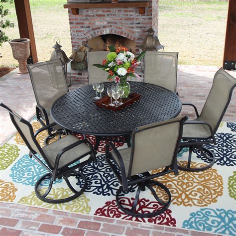 Round patio dining sets encourage a relaxed mood that pairs nicely with quiet times, family meals, and small gatherings. Madison Bay 7 Piece Sling Patio Dining Set With Swivel ...