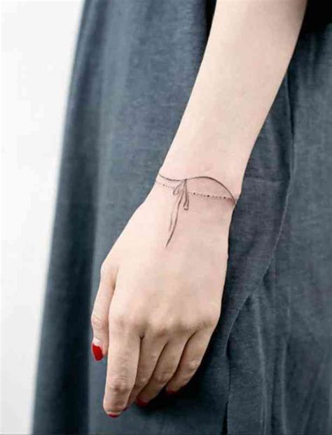 50 Simple And Elegant Tattoo Ideas For Women Tiny Wrist Tattoos Wrist
