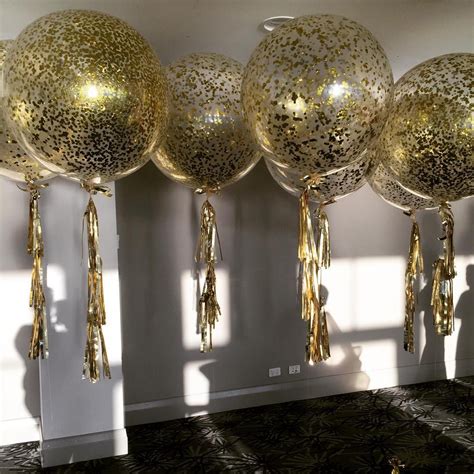 Image May Contain Indoor Balloon Tassel Gold Confetti Balloons
