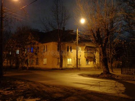 Night View On The Street With Lonely Houses And Trees Stock Photo