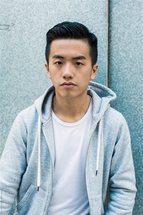 Portrait Of Handsome Male Asian Teenager by VISUALSPECTRUM