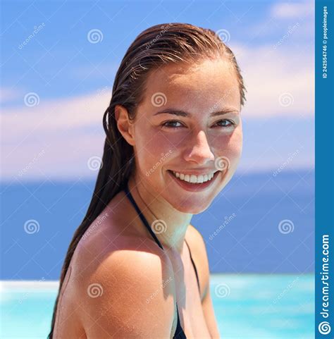 She Loves Being In The Water An Attractive Young Woman Enjoying A Swim