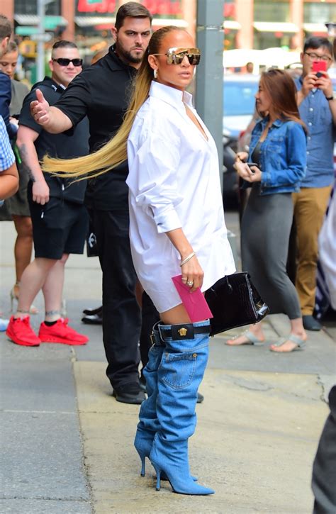 Jennifer Lopezs Versace Denim Boots Pantless Outfit Turns Heads