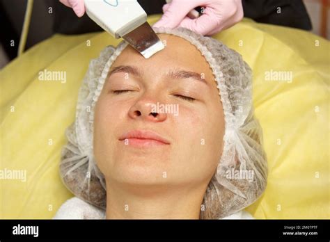 Close Up Ultrasonic Face Cleaning Modern Equipment Beautician Does