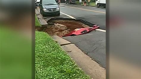 Giant Sinkhole In Virginia Swallows Mangles Parked Car Video Shows