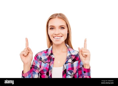 Cheerful Pretty Young Woman Pointing Up With Fingers Stock Photo Alamy