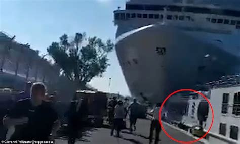 Cruise Ship Collides With A Tourist River Boat And A Dock On A Busy