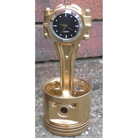 He died in the theresienstadt concentration camp. Motor-Kolben aus V8-Motor Gold mit schwarzer Uhr