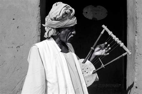 Mustafa al sunni, vocals and 'ud ; Musician - traditional musician playing "Rababa" which is a Sudanese music instrument similar to ...