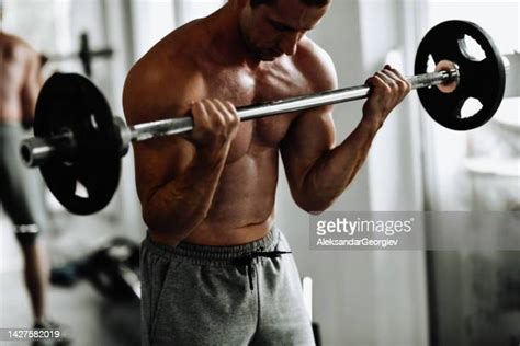 Skinny Guy Flexing Photos And Premium High Res Pictures Getty Images