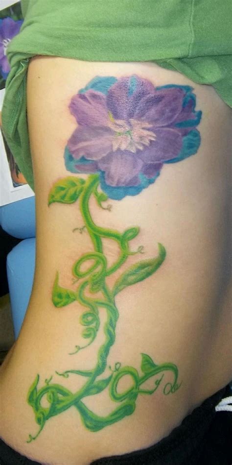 Purple Flower Rib Cage Tattoo Ribcage Tattoo Tattoos Cage Tattoos