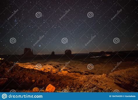 A Starry Night Over The Mitten Buttes In Monument Valley Stock Image