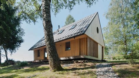 Les Archinautes And Ae Create Timber Cabin Overlooking Lake In Czech