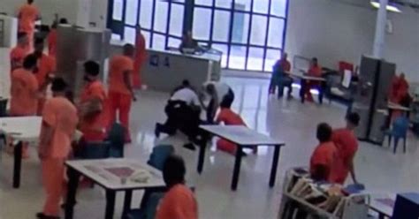Inmate Tries To Strangle Prison Guard In Video